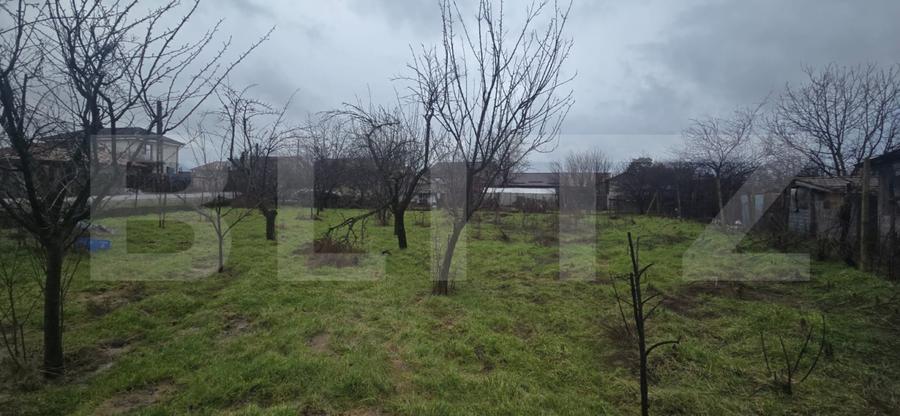 Teren intravilan 1.869 mp, front 80 metri, zona Cârcea - Stadion