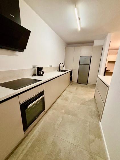 Inchiriez ap. 2 camere, complex ELITE,58 mp cu garaj, nou!