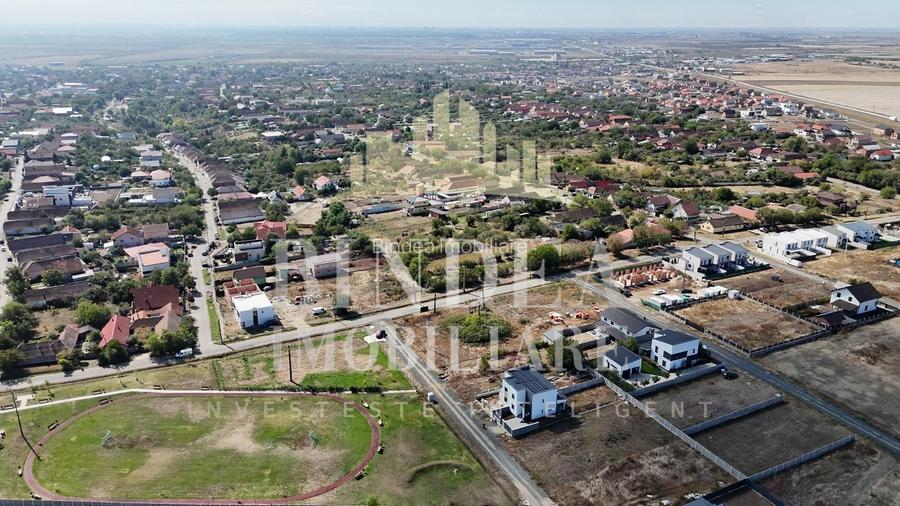 Teren intravilan 703mp pe colt cu doua fronturi generoase Giarmta