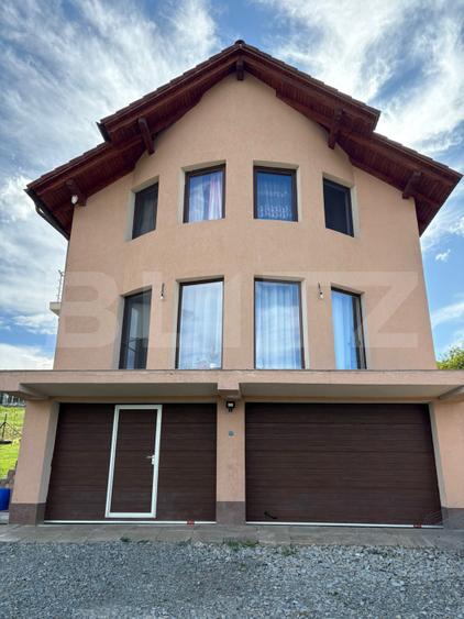 Casă de vânzare 140 mp, 5 ari teren, garaj interior – zona Pensiunea Morariu