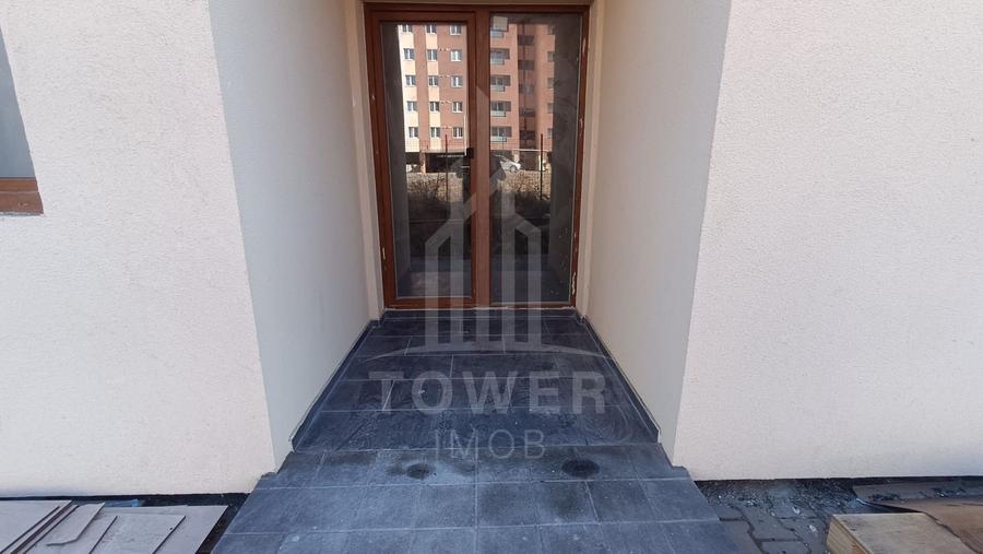 Apartament cu trei camere si gradina proprie