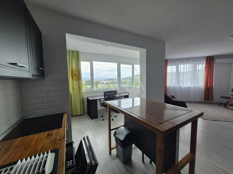 Apartament modern cu birou și panoramă deschisă – zona BMW.