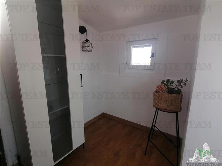 Apartament mansardabil de vanzare