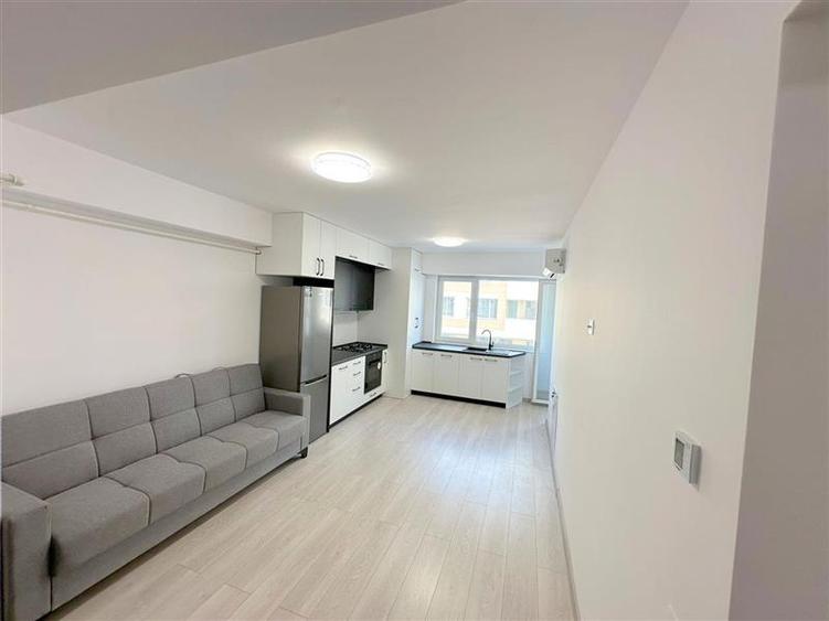 Apartament 2 camere, etaj 2, utilat, semimobilat, cu loc parcare zona Nord