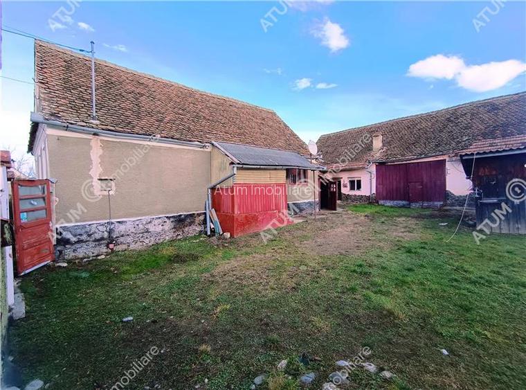 Casa cu 4 camere si 1650 mp teren la doar 30 km distanta de Sibiu - 12