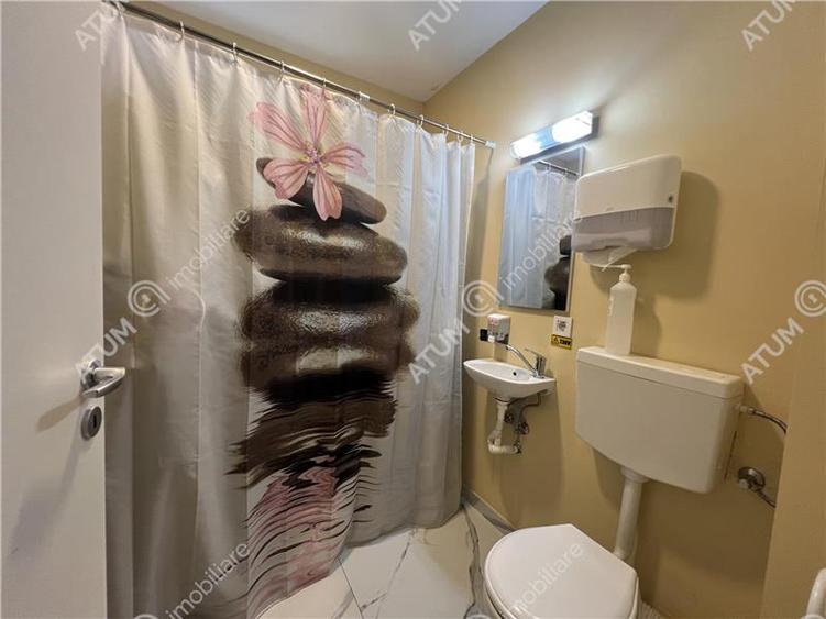 Spatiu comercial de 2 camere cu 2 bai 3 locuri de parcare zona Lazaret