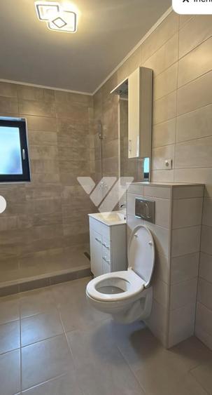 Apartament 2 camere la parter loc de parcare geam la baie