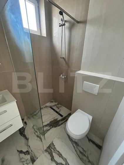 Duplex modern cu teren de 450 mp!