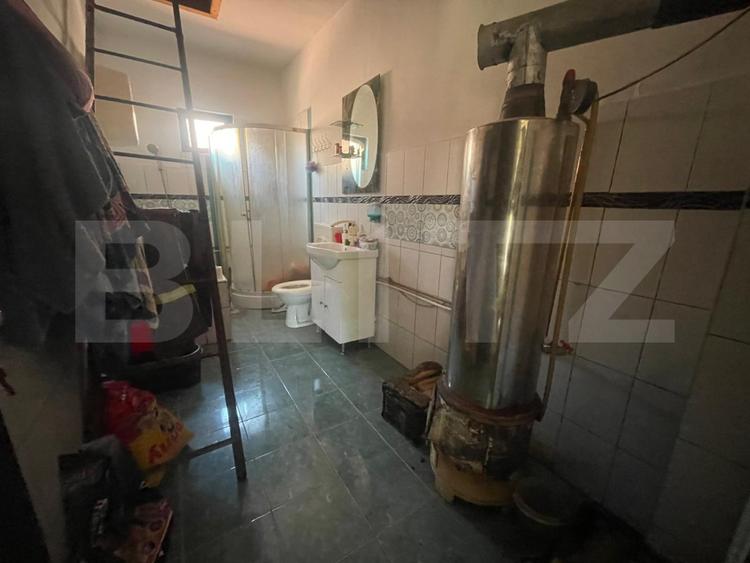 Casă cu 3 camere și un teren în suprafață de 6000 mp