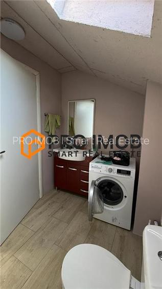 Casa tip P+M si garaj zona Spataru - Costesti - 11