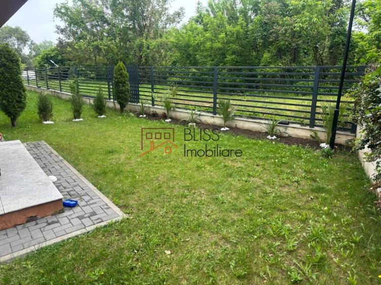 Apartament cu grădină generoasă și parcare