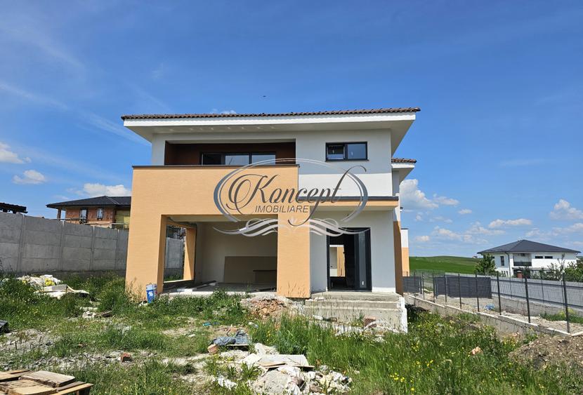 Casa individuala cu garaj si terase generoase in Chinteni