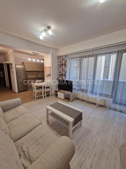 ASE -  Romana - Dorobanti - 2 camere - mobilat utilat  modern - centrala termica - 8