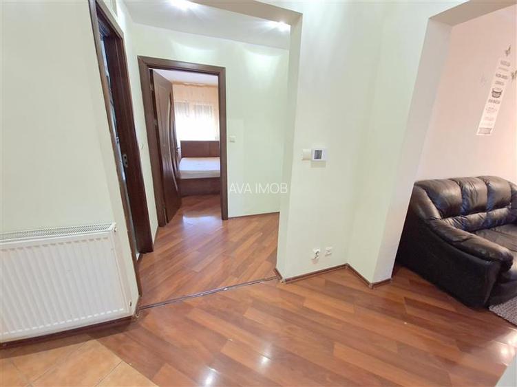 Apartamnet 3 decomandate, etaj 2, cu 2 bai, centrala, zona Ura - 24