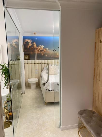 Apartament în Arcadia Domenii,230mp curte,3 parcări incluse