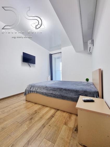 Apartament cu 2 camere și un balcon cât un hol de hotel