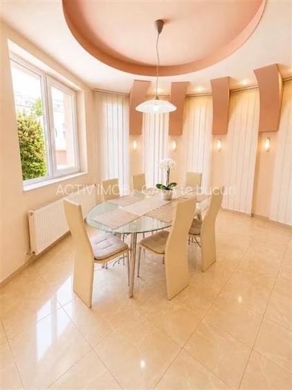 Vila eleganta cu 4 dormitoare - demisol - curte - terasa