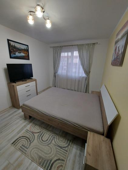 Apartament cu 3 camere,etaj intermediar,parcare subterana,zona Eroilor