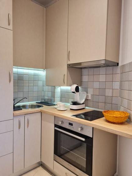 Garsoniera Dorobanti NOU - design rafinat, complet utilata, etj 1, bloc tip vila
