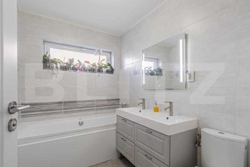 Casa moderna 3camere si mansarda amenajata in zona linistita Tarlungeni