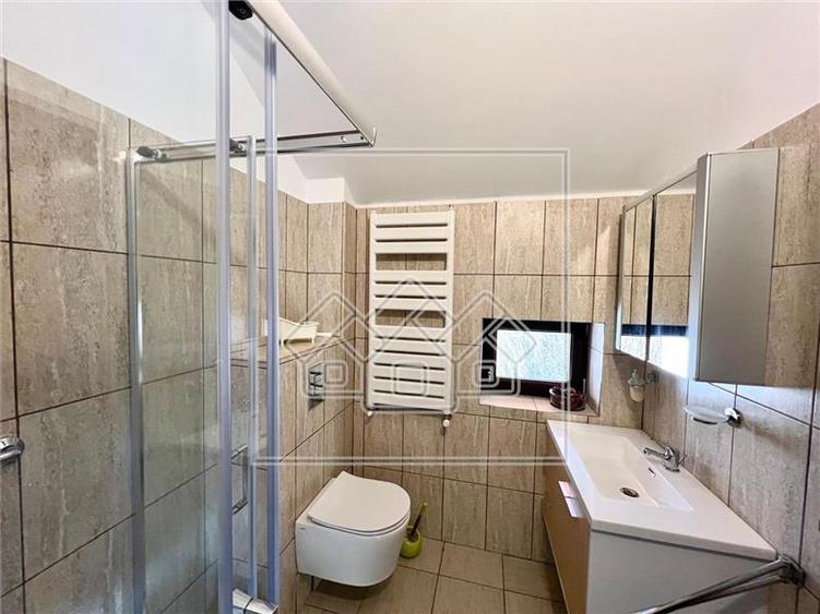 Casa de vanzare in Cisnadioara - 450 mp utili, garaj, teren 900 mp