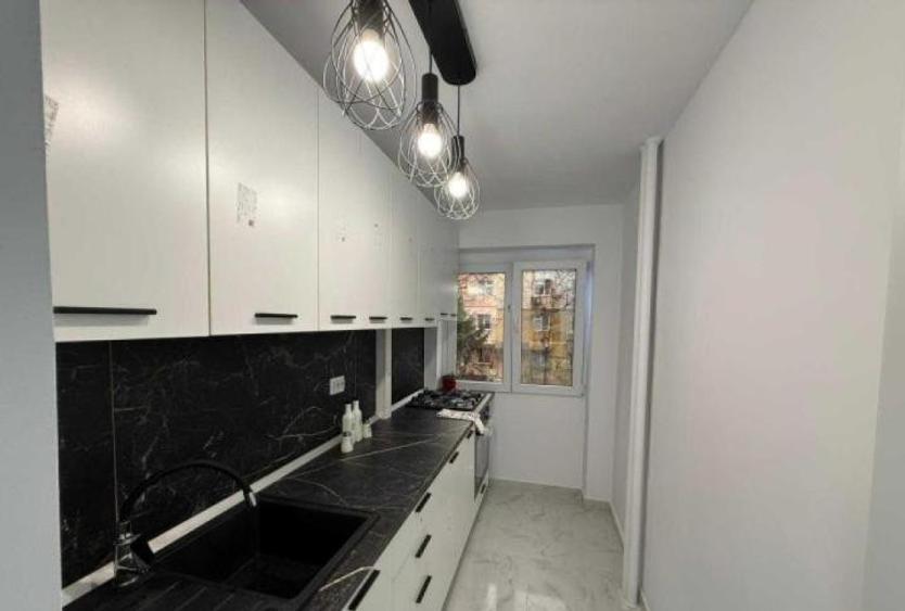 80000 euro -2camere-et 1din 4 - renovat- brancoveanu