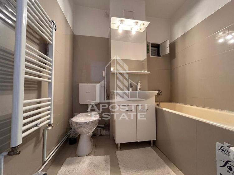 Apartament 3 camere, etaj intermediar cu centrala in Piata Marasti.