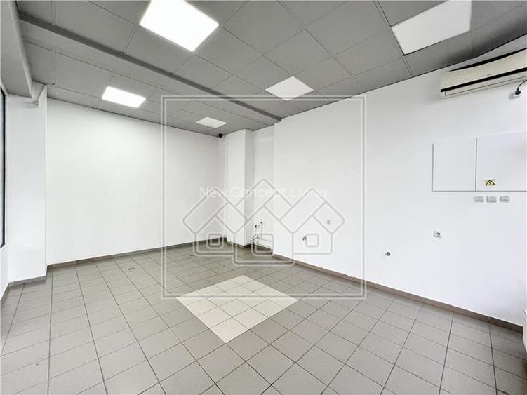 Spatiu comercial cu vitrina la strada - 177 mp - finisat la cheie - 11