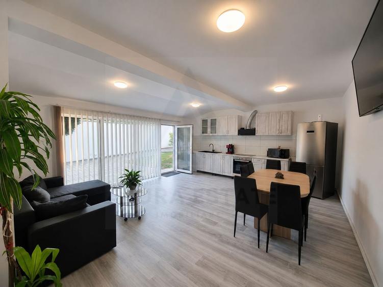 Casă cu 2 apartamente 5 camere 140 mp utili curte 289 mp in Turnișor