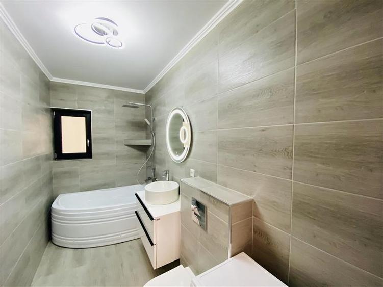 Ap. 2 camere si gradina, mobilat si utilat modern, zona D. Stanca