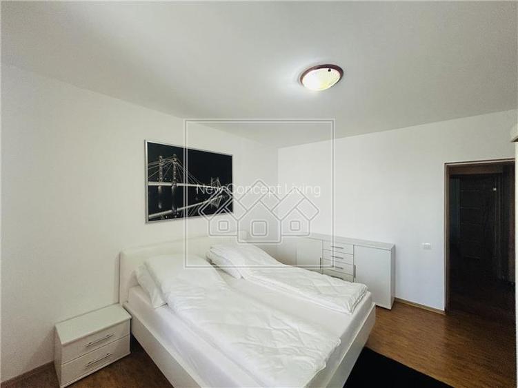 Ap spatios, 3 camere, 2 balcoane, loc de parcare , etaj 1 - Turnisor - 11