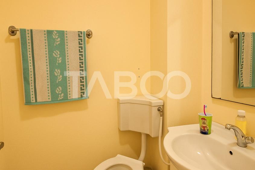 Apartament etaj 1 de vanzare 3 camere 2 bai balcon pivnita Cisnadie