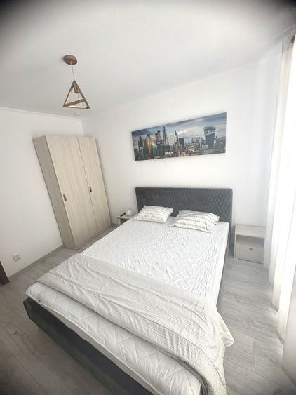Apartament la casă, cu 4 camere