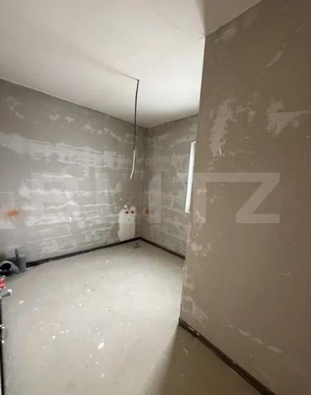 Casă individuală în Chinteni, 120 mp utili, teren de 500 mp, garaj