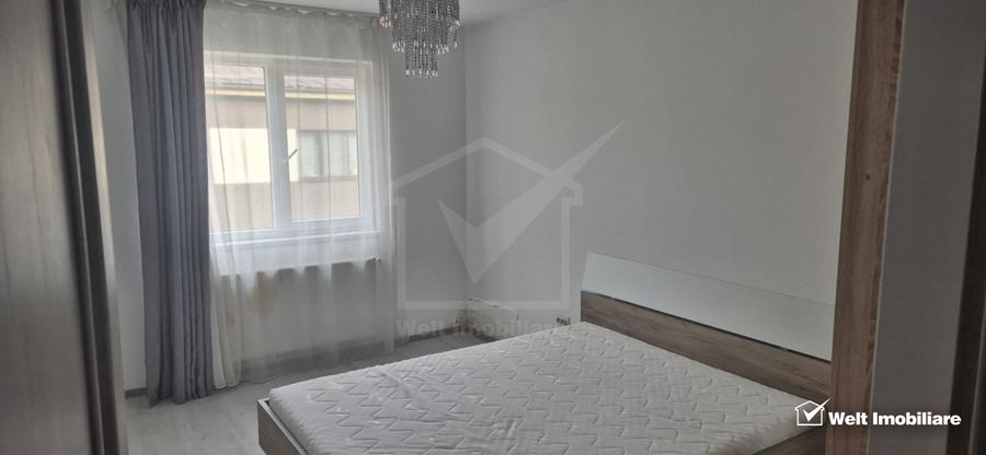 Apartament cu doua dormitoare, parcare proprie, mobilat si utliat