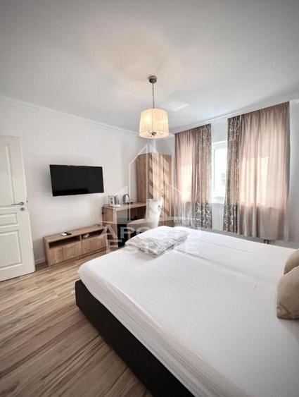 Cladire cu 4 apartamente si sala de evenimente ptr 60 persoane