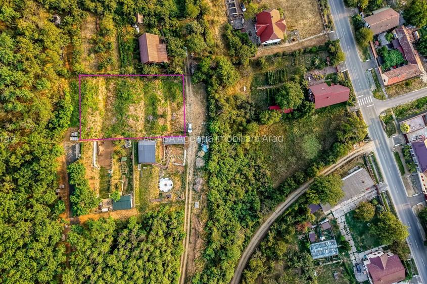 Teren pe deal, 1.150 mp, în Miniș, front 26 m, Drumul Vinului - 7