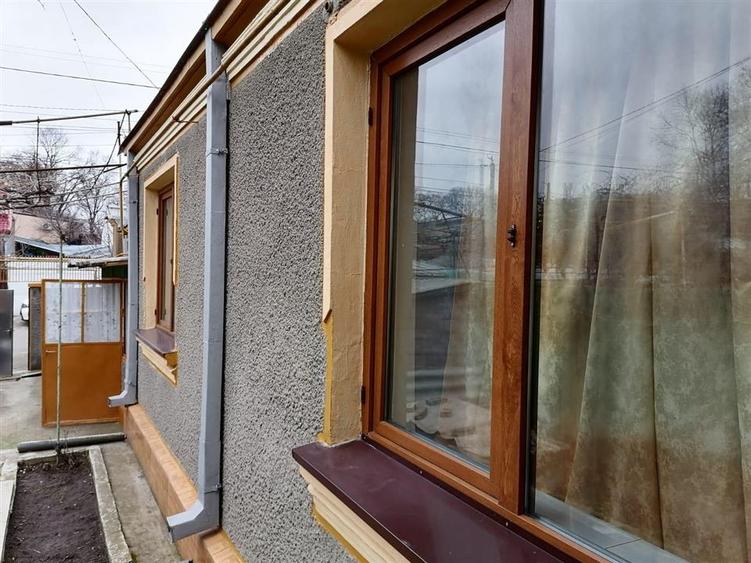 Casa 4 cam zona Bd.Cuza V C.Galati teren 210 mp cu 11 deschidere