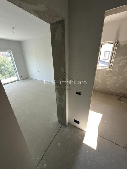 Casă modernă cu garaj și grădină privată într-o zonă liniștită din Florești - 9