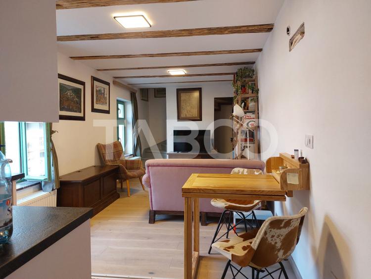 Casa de vanzare 3 camere 2 bucatarii 3 bai teren 340 mp Cisnadie