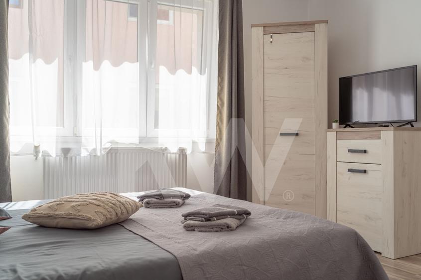 Investiție în Centrul Istoric al Sibiului – 2 apartamente, business funcțional