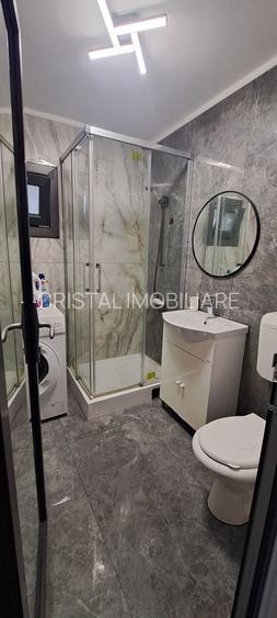 Garsoniera moderna, zona Chisinau, etaj 7, totul nou, mutare imediata - 4