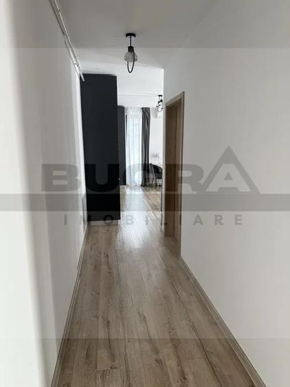 Apartament 2 camere, etaj intermediar, parcare, zona Frunzisului