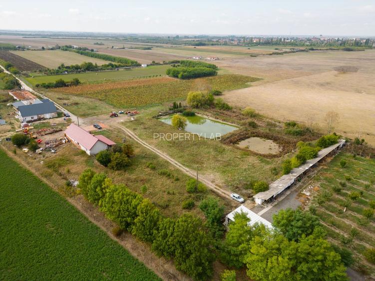 Casă cu teren 13 418 mp intravilan