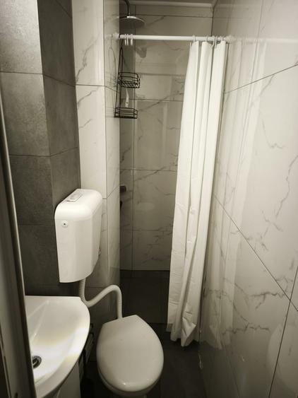Apartament cu 2 camere, etajul  3/4, zona Podu Ros