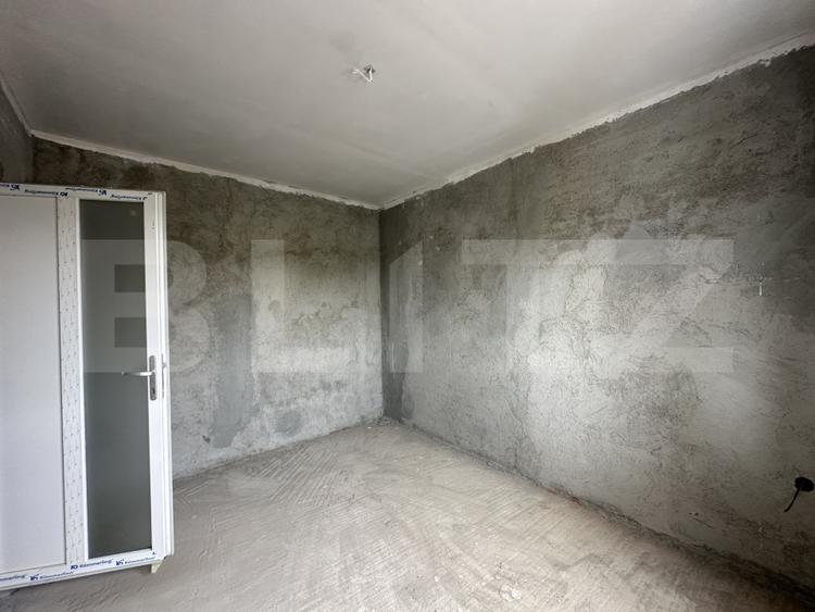 Casă cu garaj, 130 mp, teren 619 mp - zona Cionchesti