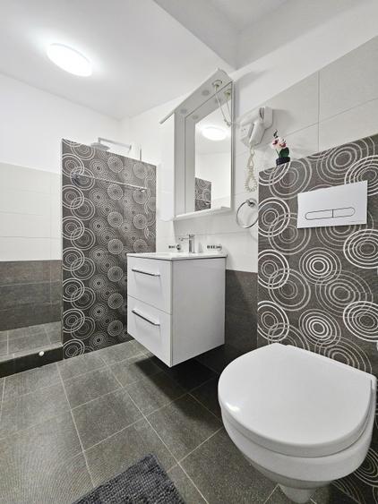 Apartament 2 camere + pod amenajat, in folosinta exclusiva.