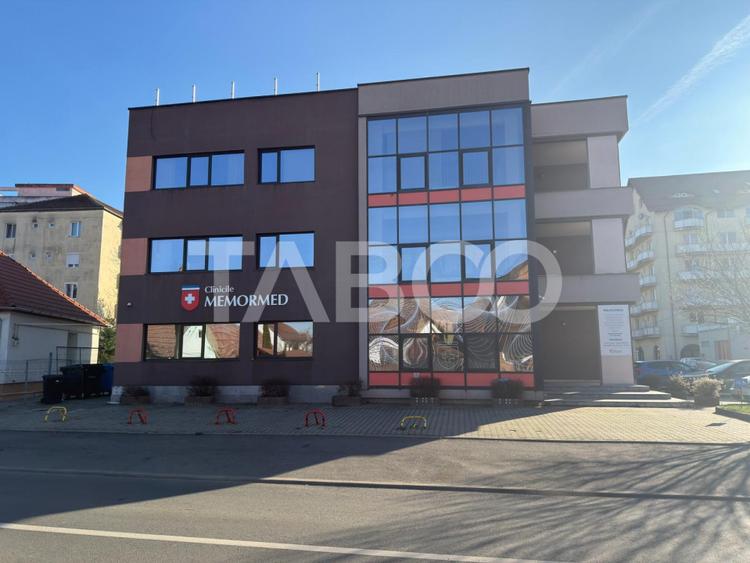 Cladire moderna cu teren 890 mp P+2E+ET birouri si spatiu comercial
