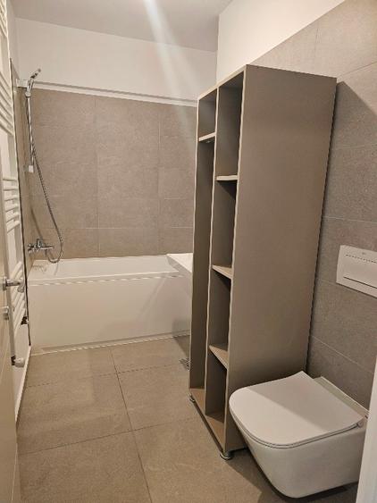 Vand apartament cu 2 camere,mobilat,utilat ,nelocuit,nou,parcare subterana