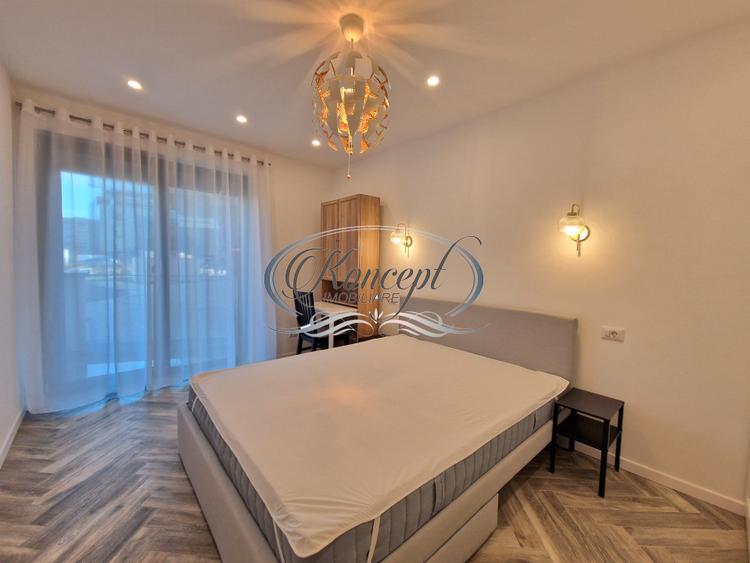 Apartament mobilat cu parcare subterana si terasa